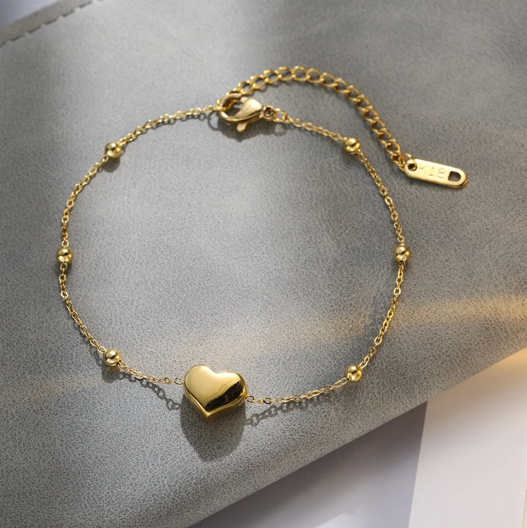 18 Karat Gold Plated bracelet with unique solid heart and beads ...
